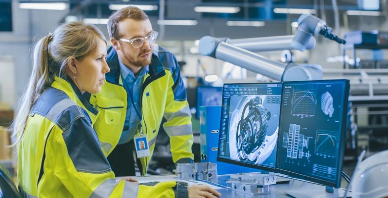 two engineers working in front of computer, technique